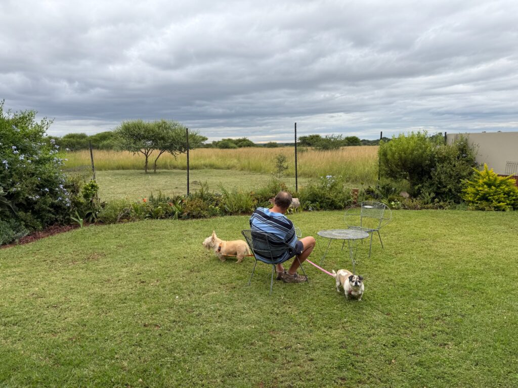 Showcase retirement village resident enjoying the green belt of his bushveld stand